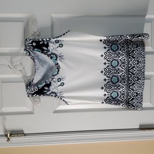 Tank top blouse with floral and scroll design in size Medium